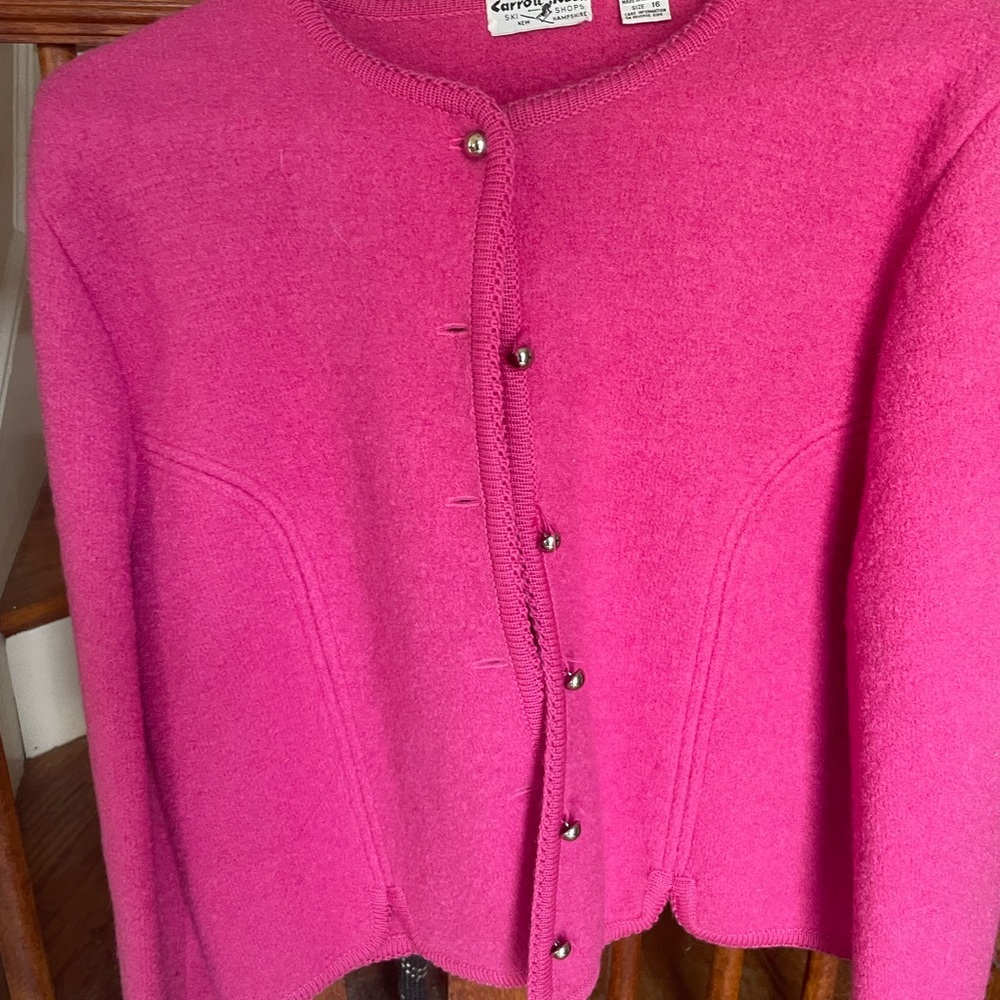 Black wool and pink wool jackets. With pearl buttons